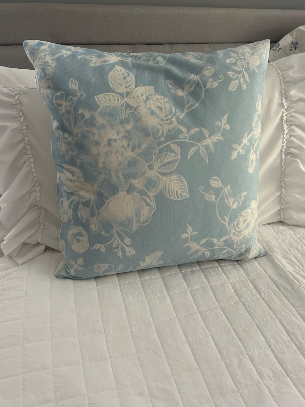 Blue Floral Throw Pillow with Cream Pattern
